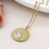 POM Brushed Faux Gold Disc with Silver Fern Inlay Necklace