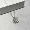 Unique and Co Sterling Silver and CZ Tree of Life Circle Necklace